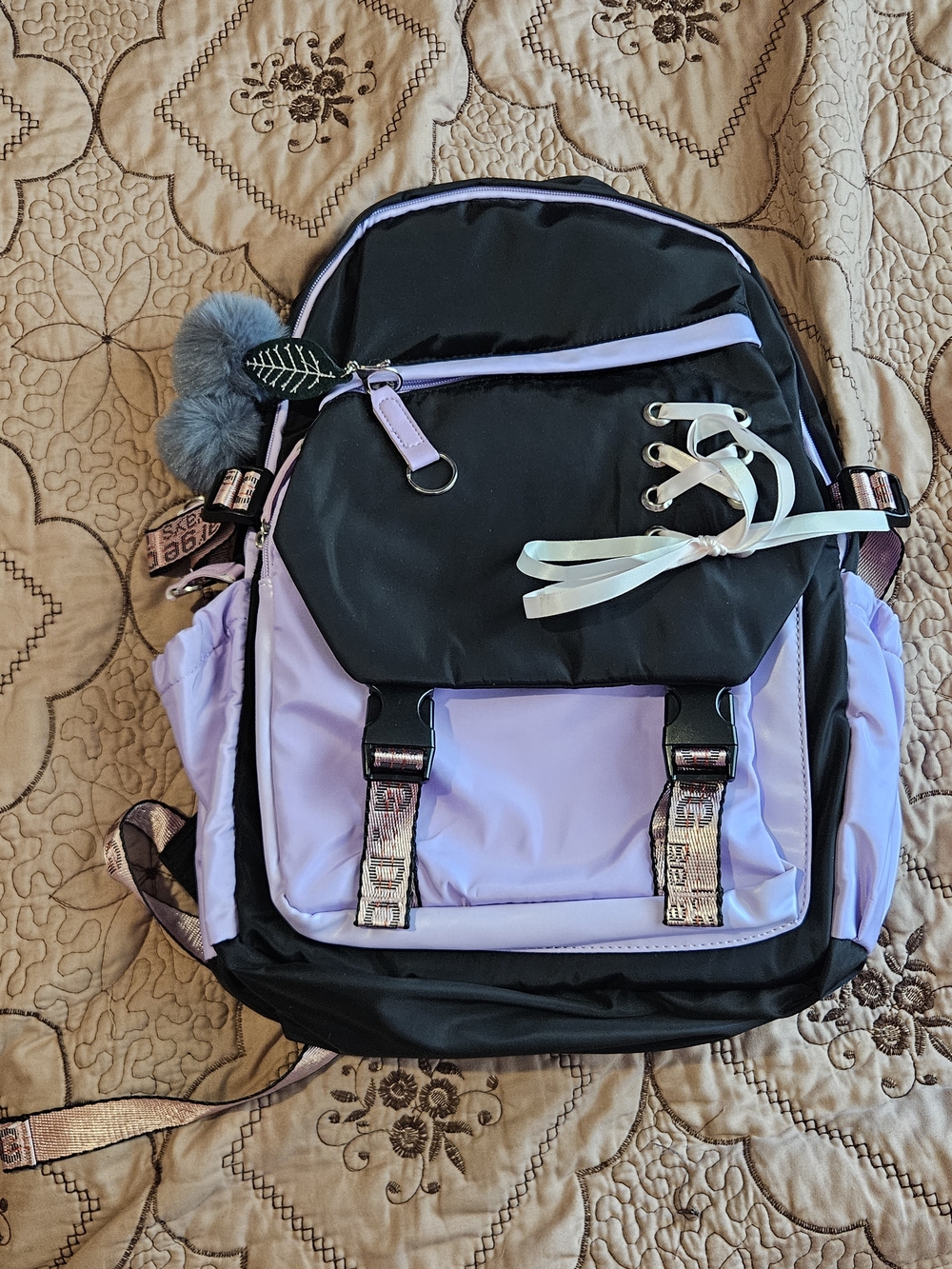 black and purple lace backpack